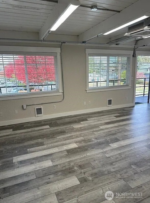 118 4th Avenue Southeast, Unit 118 Puyallup, WA 98372 - Photo 8 of 14 a view of an empty room with a window