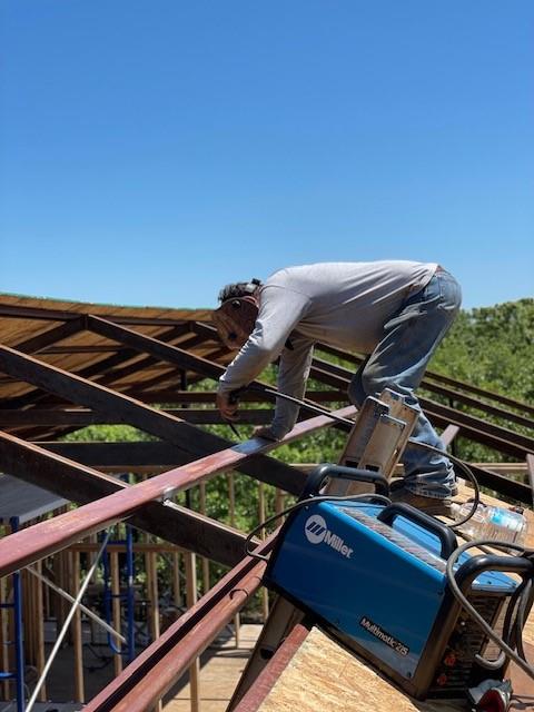 924 The Oil Road Gainesville, TX 76240 - Photo 39 of 39 Erecting Walls and Roof