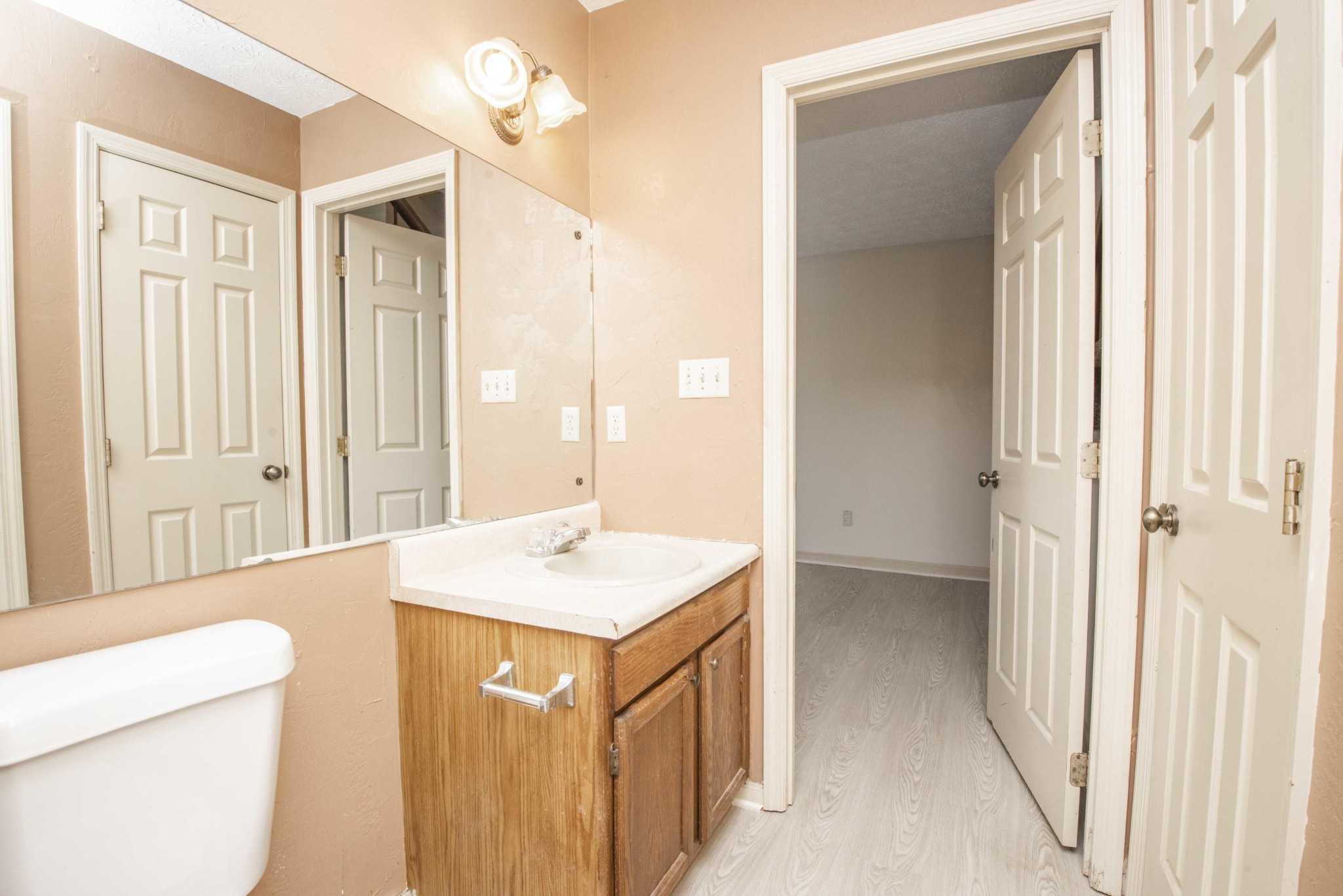 149 High Point Lane Oak Ridge, TN 37830 - Photo 11 of 27 a bathroom with a sink a vanity and a mirror