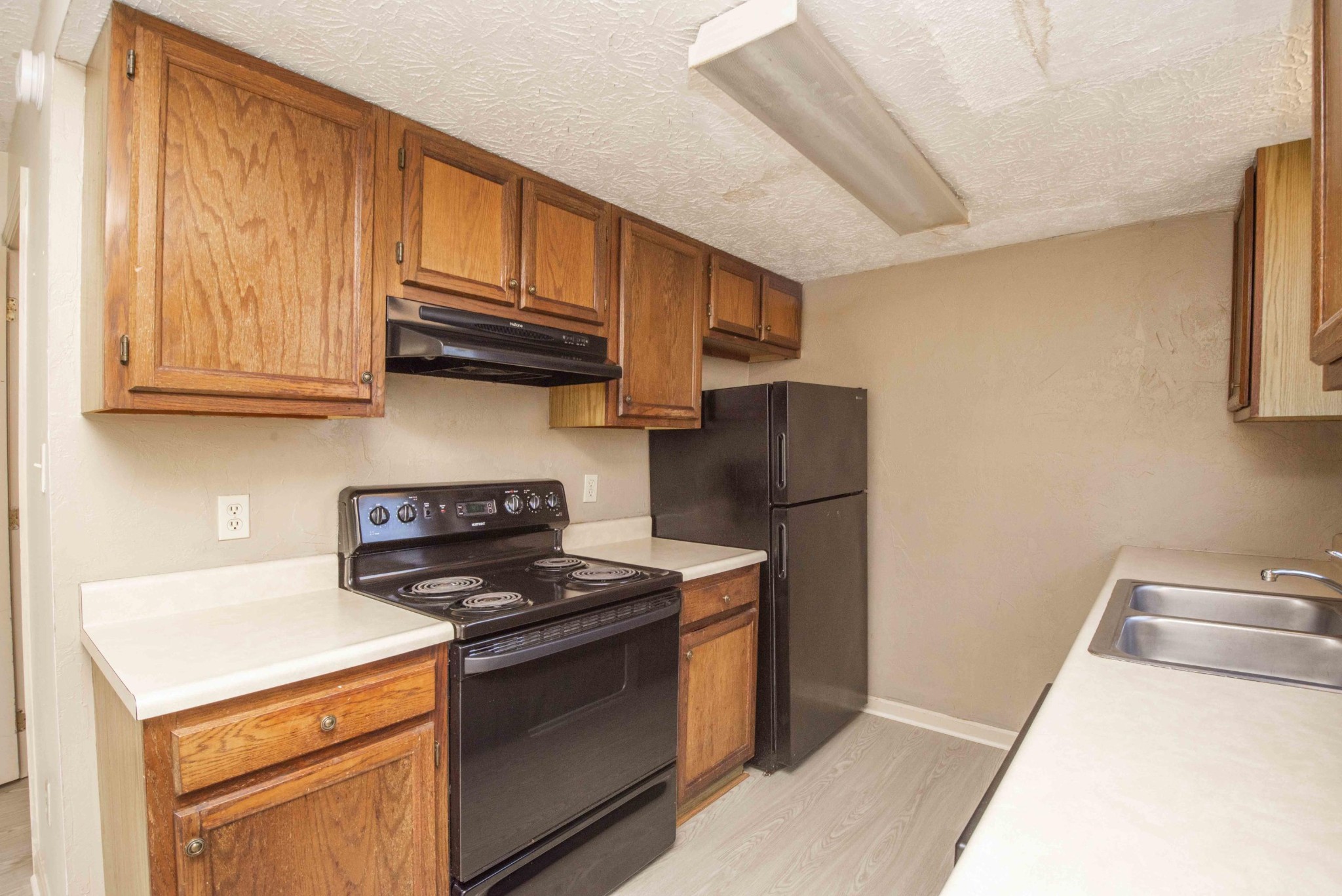 149 High Point Lane Oak Ridge, TN 37830 - Photo 14 of 27 a kitchen with stainless steel appliances granite countertop a refrigerator stove and sink