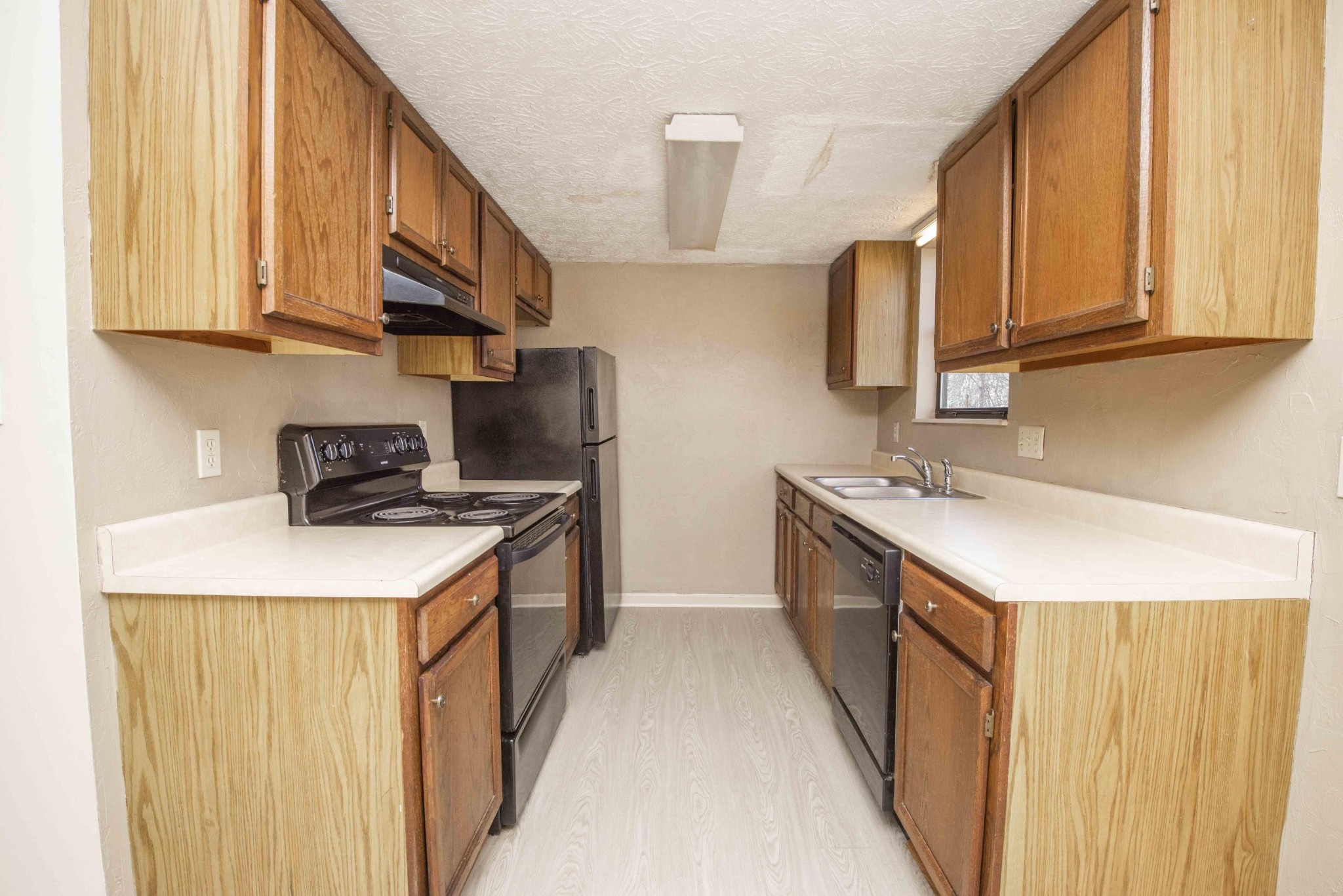 149 High Point Lane Oak Ridge, TN 37830 - Photo 15 of 27 a kitchen with stainless steel appliances granite countertop a sink stove and cabinets