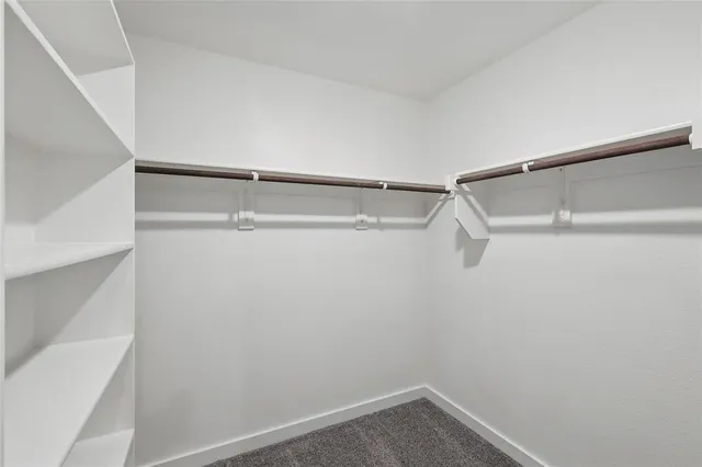 a bathroom with 2 sink and a mirror