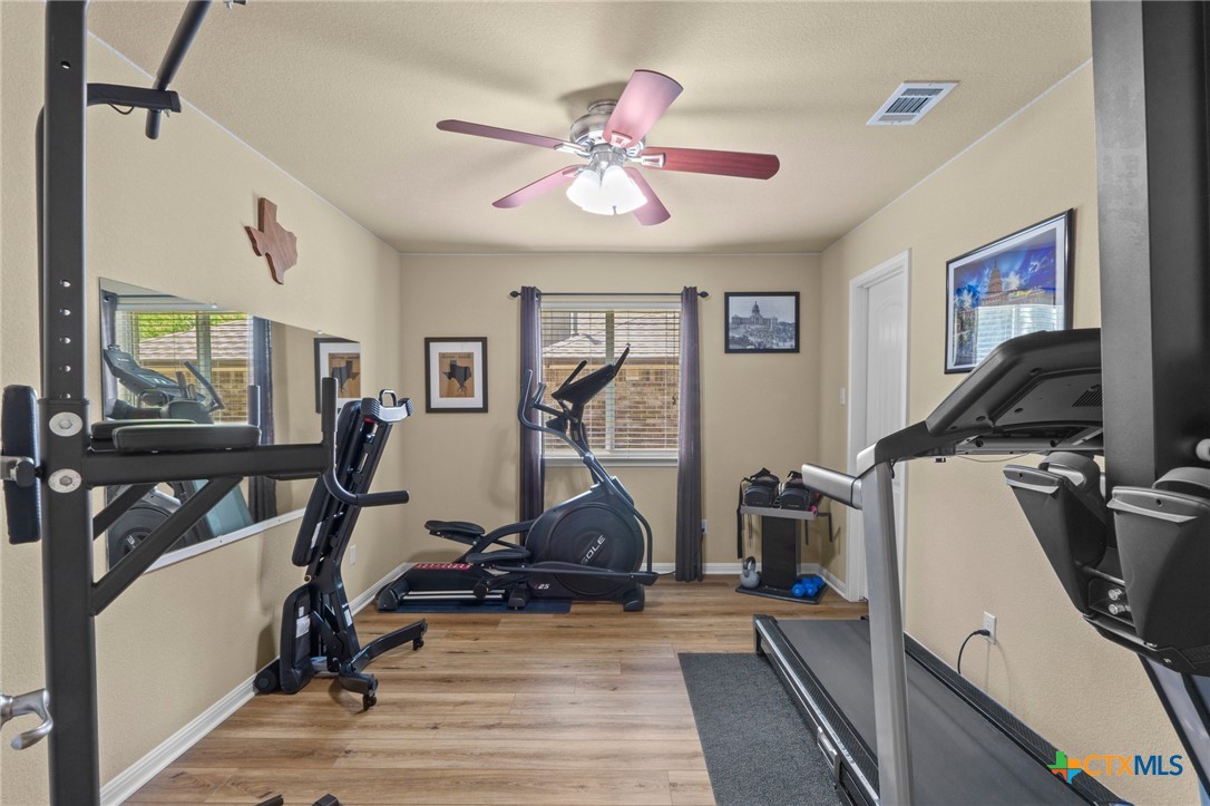 20525 Jackies Ranch Boulevard Pflugerville, TX 78660 - Photo 16 of 30 Fourth bedroom being used as fitness room. Has walk-in closet.