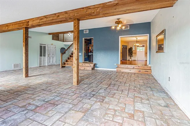 a view of a porch with a rug