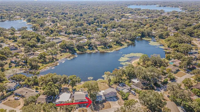 an aerial view of residential house with outdoor space