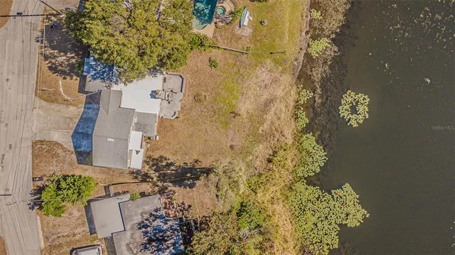 view of a house with a yard