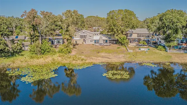a view of a lake with a building in the background
