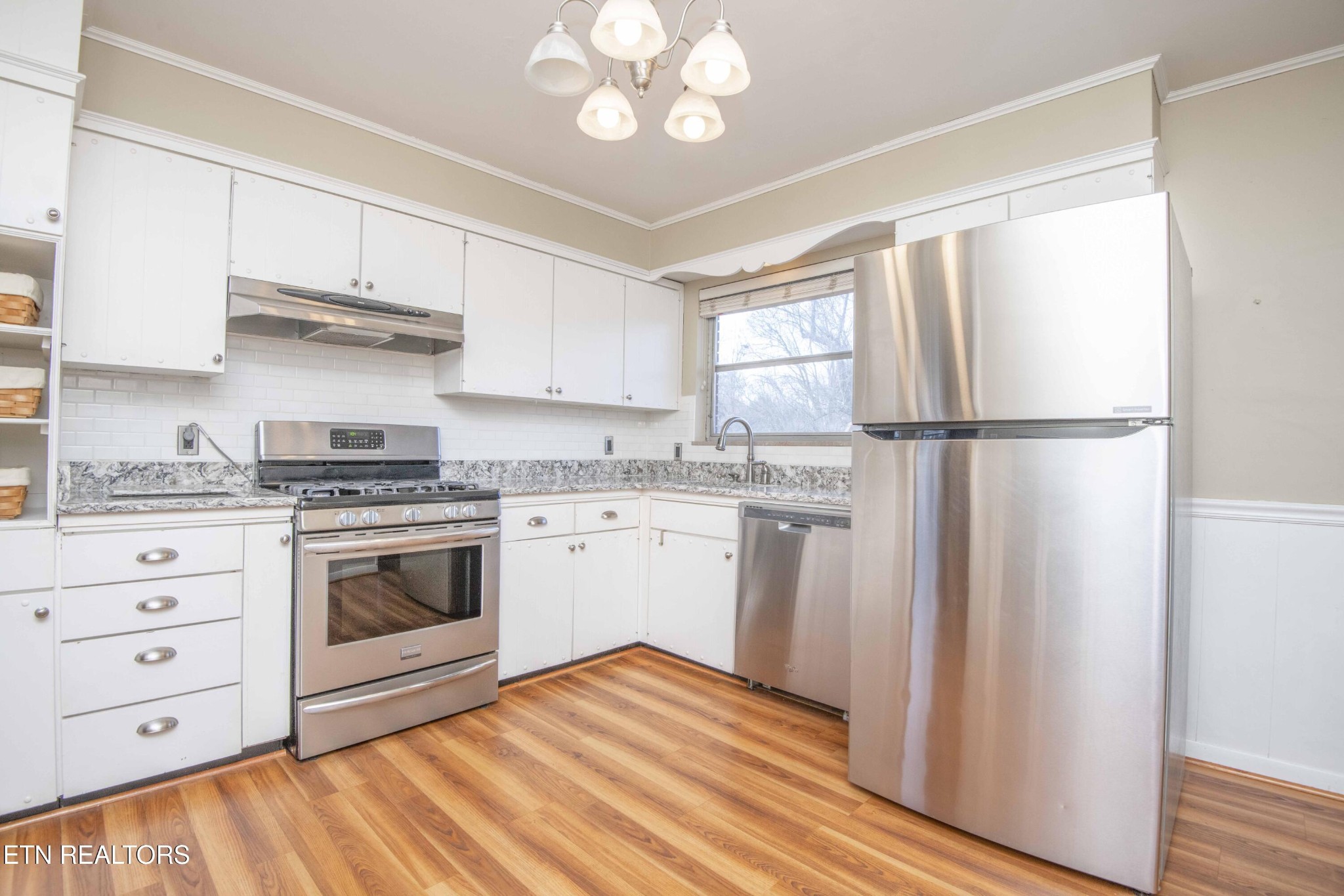 5409 Inwood Road Northwest Knoxville, TN 37921 - Photo 24 of 47 a kitchen with white cabinets and white appliances