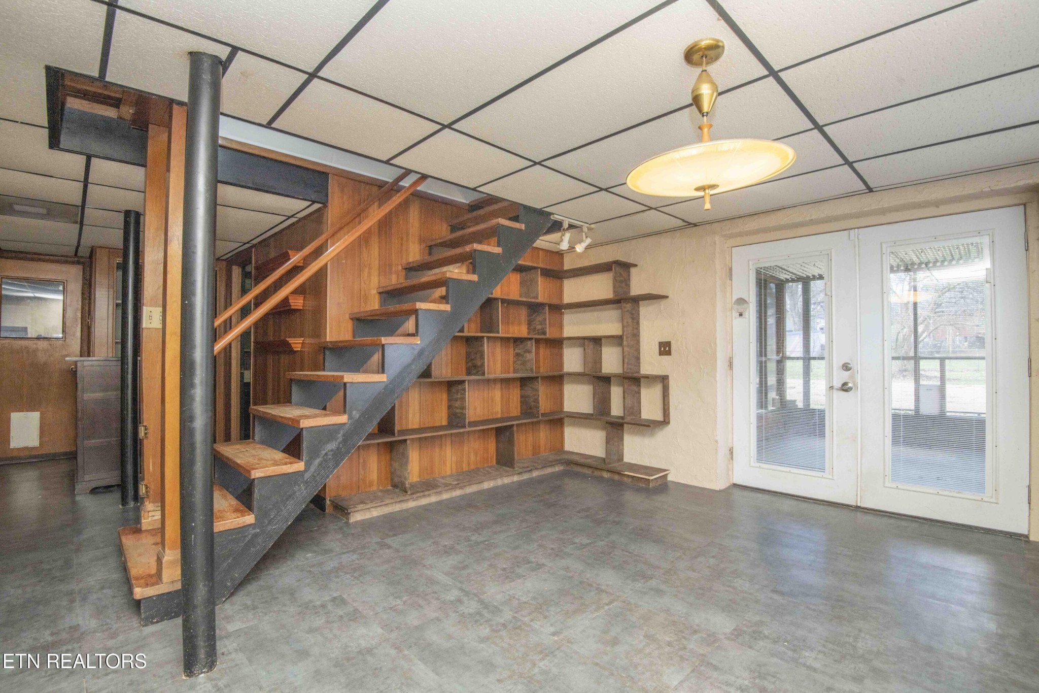 5409 Inwood Road Northwest Knoxville, TN 37921 - Photo 27 of 47 a view of an empty room with a staircase