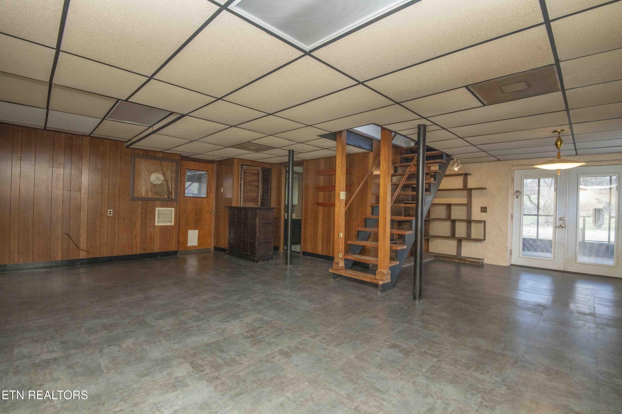 5409 Inwood Road Northwest Knoxville, TN 37921 - Photo 29 of 47 a view of empty room with wooden walls