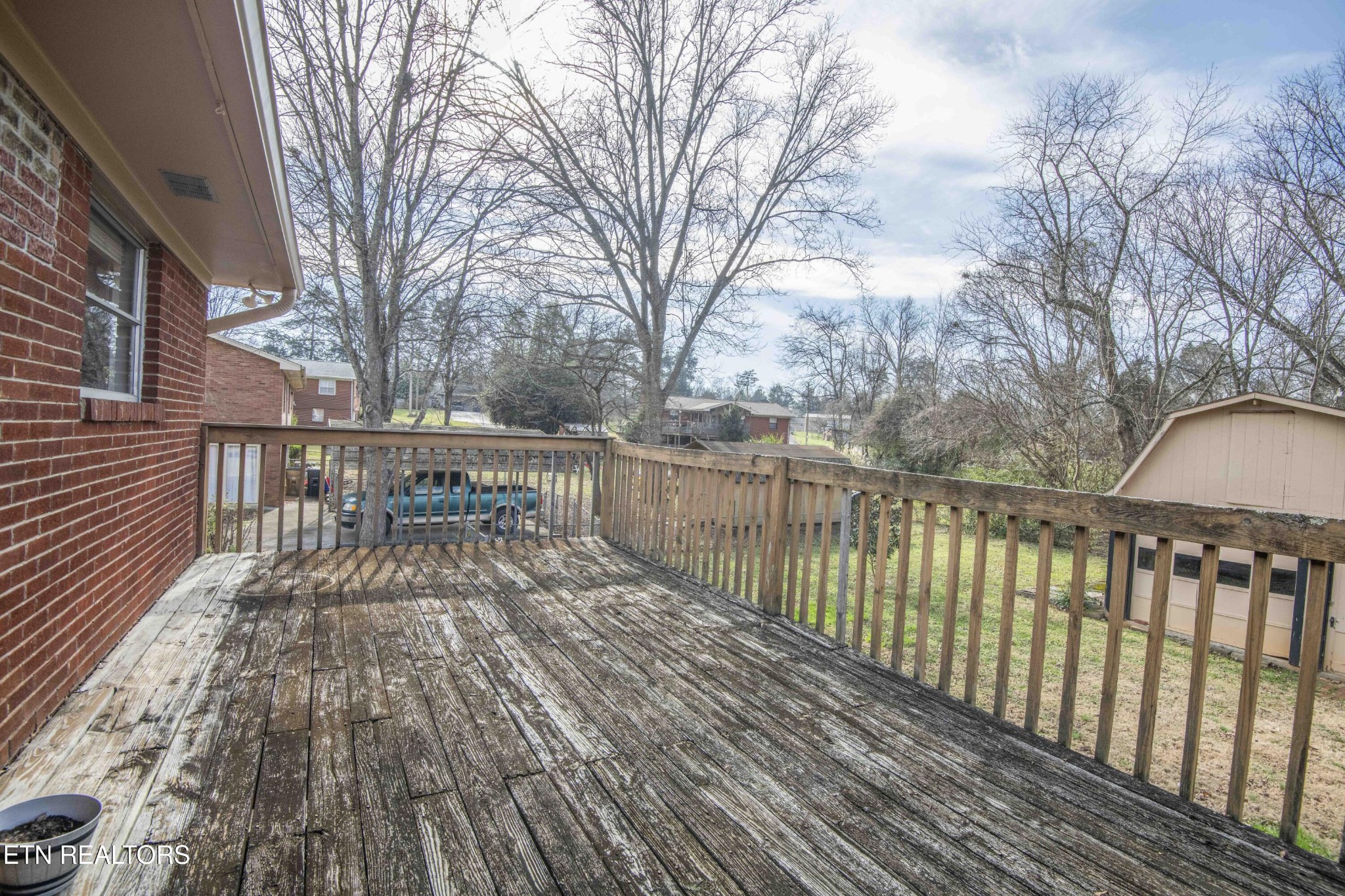 5409 Inwood Road Northwest Knoxville, TN 37921 - Photo 36 of 47 a view of balcony with wooden floor and fence