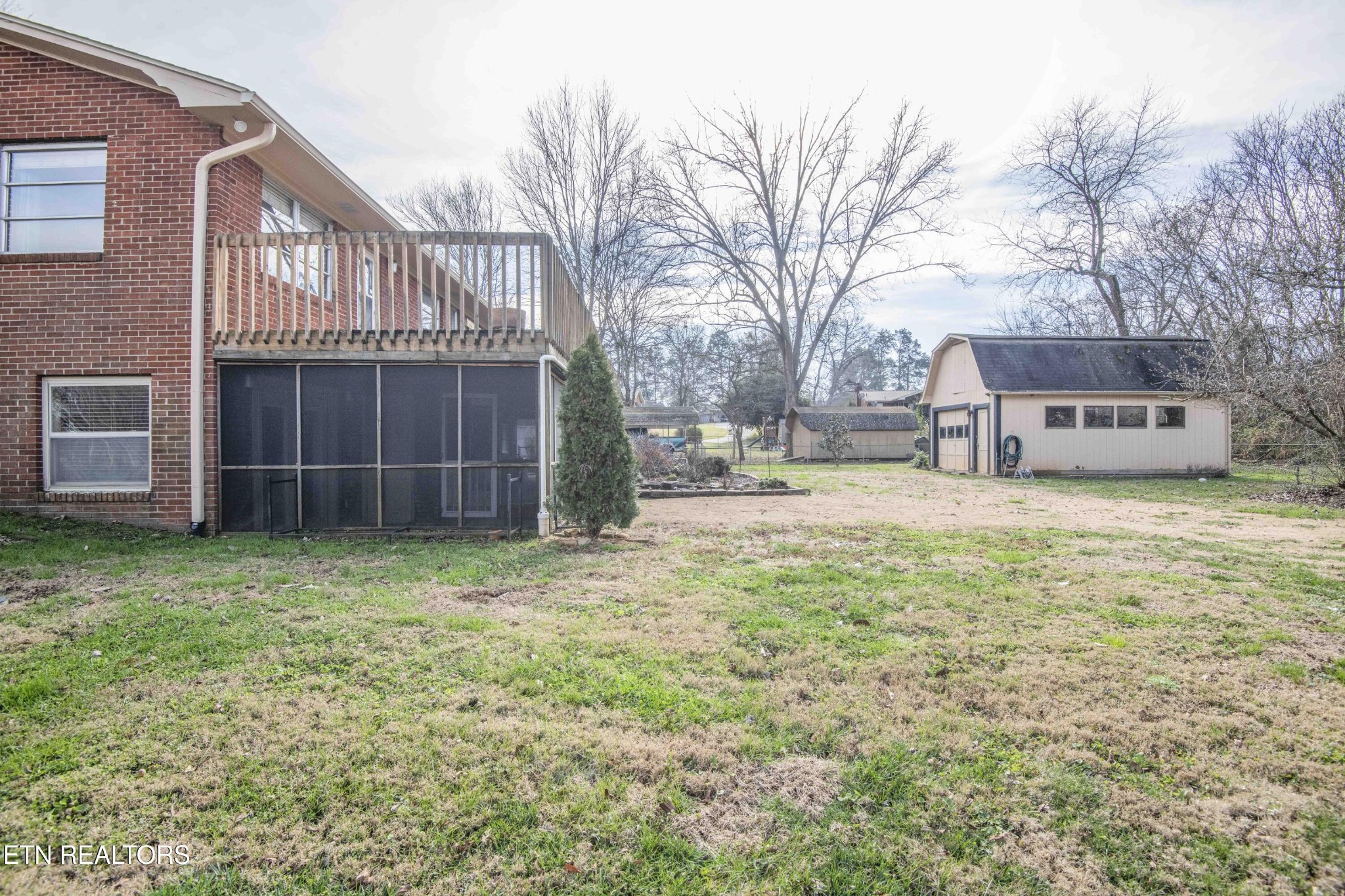 5409 Inwood Road Northwest Knoxville, TN 37921 - Photo 39 of 47 a view of a house with a yard and sitting area