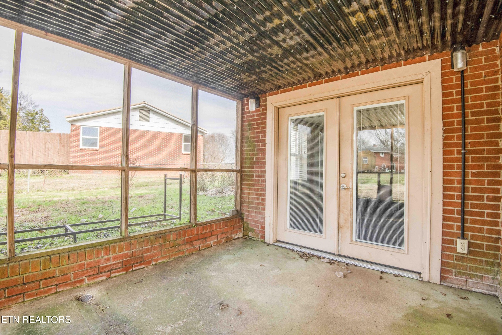 5409 Inwood Road Northwest Knoxville, TN 37921 - Photo 40 of 47 a view of an empty room with a sliding door