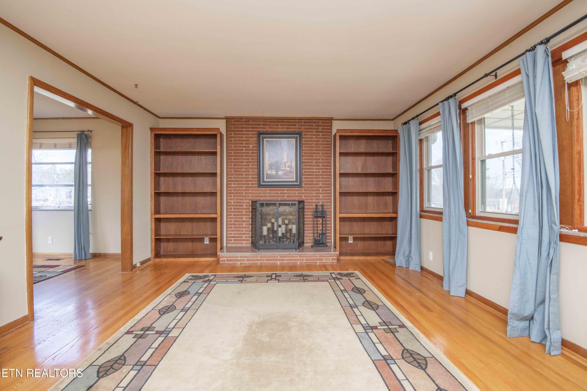 5409 Inwood Road Northwest Knoxville, TN 37921 - Photo 5 of 47 a room with a bed and a large window
