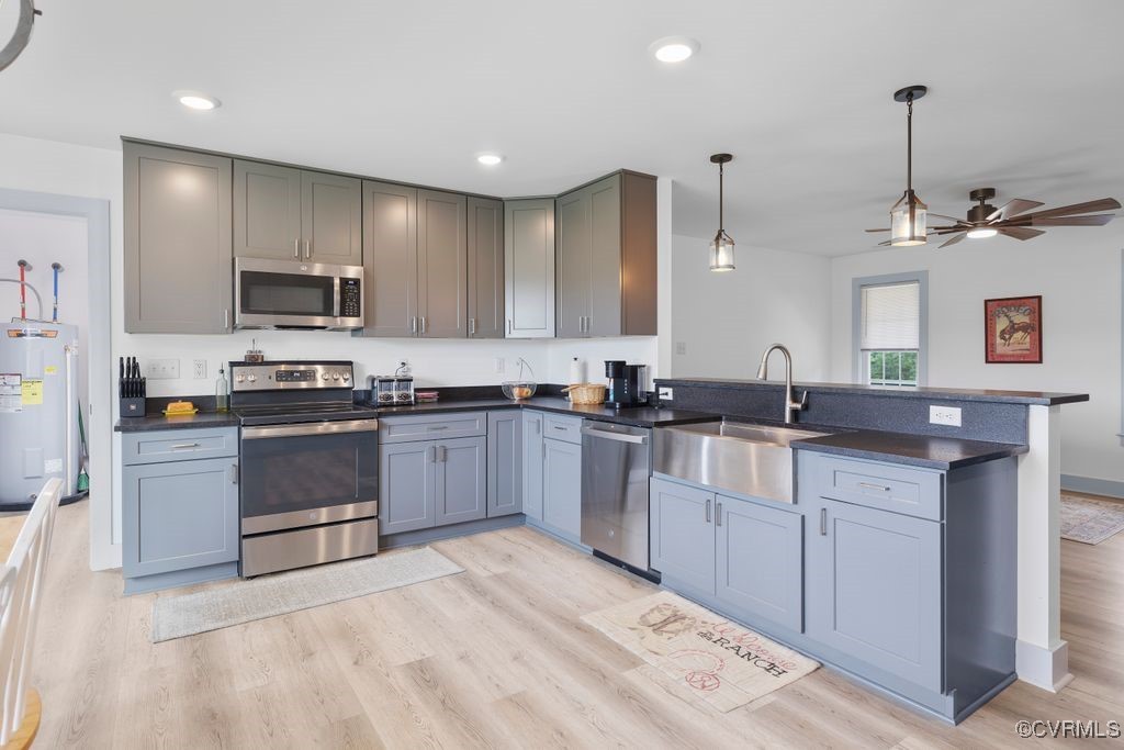 9530 Dabneys Mill Road Manquin, VA 23106 - Photo 11 of 40 Kitchen featuring stainless steel appliances,a pen