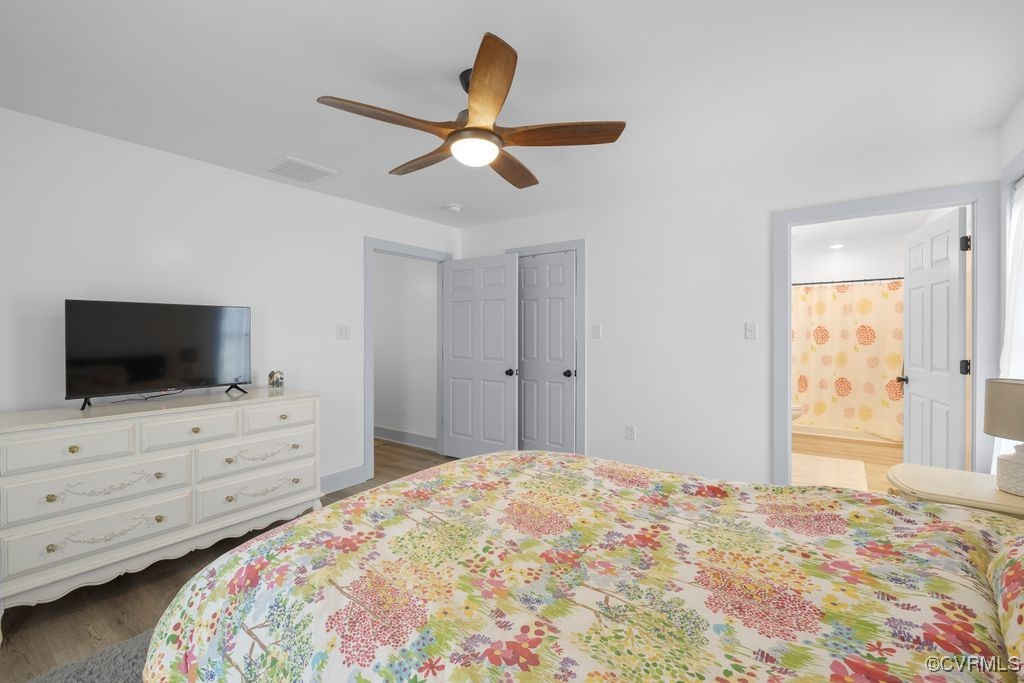 9530 Dabneys Mill Road Manquin, VA 23106 - Photo 17 of 40 Bedroom with wood style LVP floors, ceiling fan, e