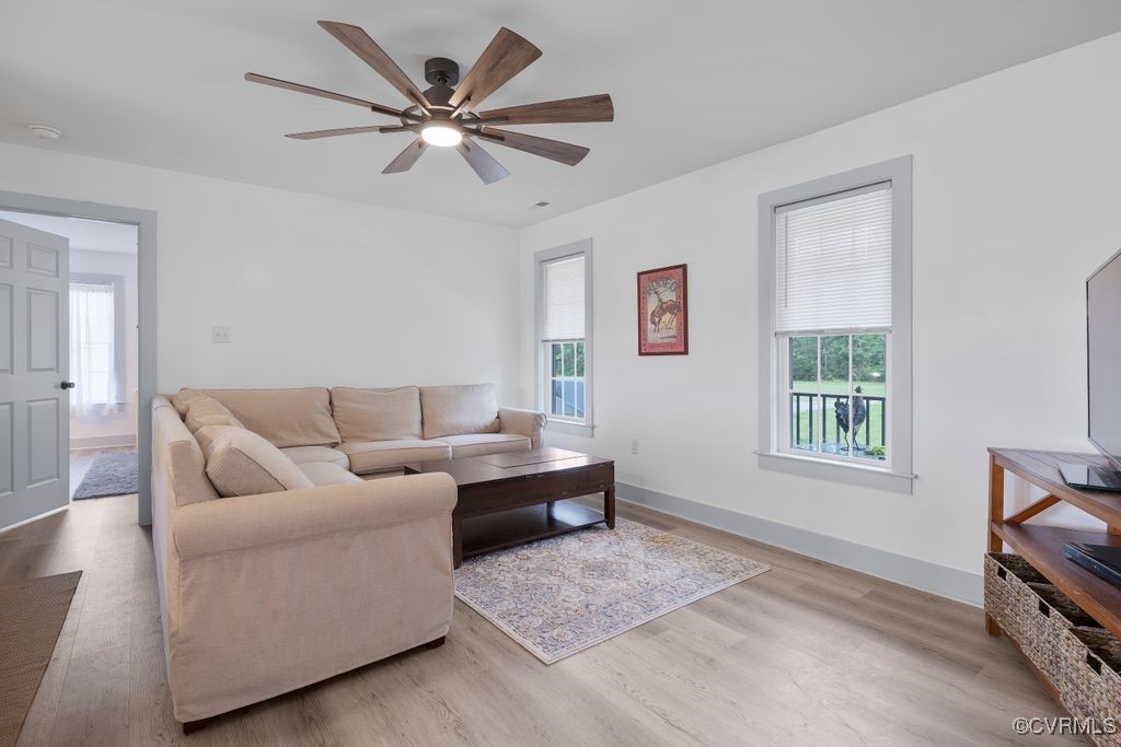 9530 Dabneys Mill Road Manquin, VA 23106 - Photo 8 of 40 Living room featuring a ceiling fan and LVP floors