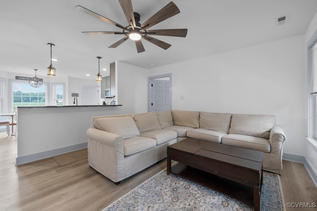 9530 Dabneys Mill Road Manquin, VA 23106 - Photo 9 of 40 Living room featuring light wood-type LVP flooring