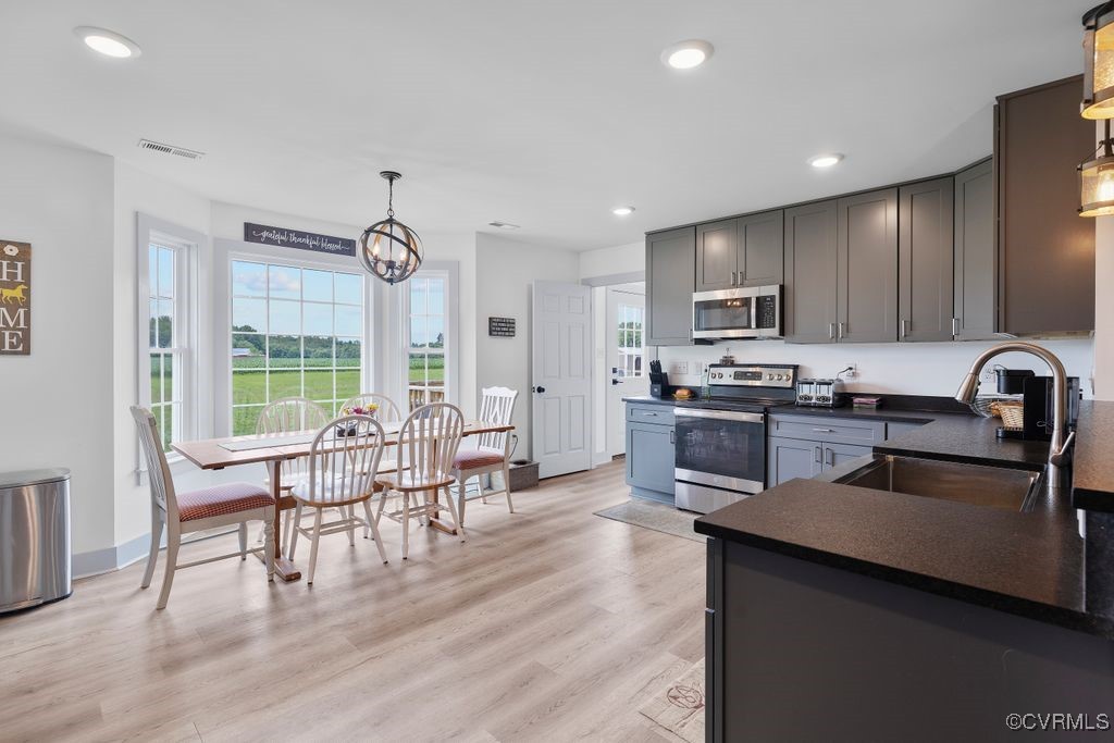 9530 Dabneys Mill Road Manquin, VA 23106 - Photo 10 of 40 Kitchen featuring stainless steel appliances, dark