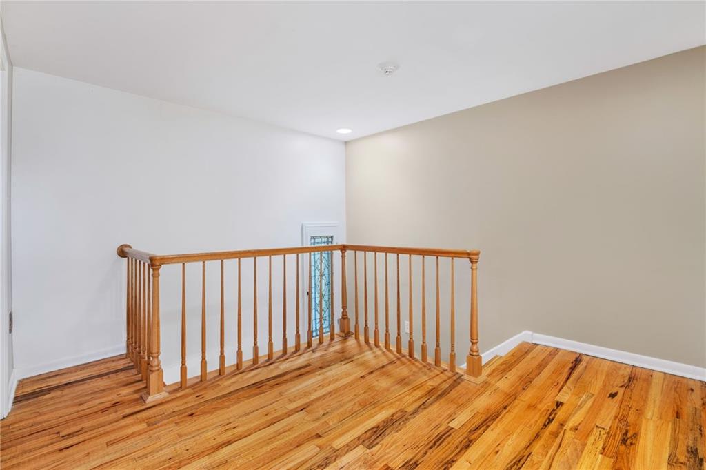 199 Farmington Road Pittsburgh, PA 15215 - Photo 20 of 46 a view of a room with wooden floor