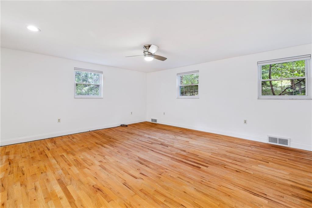 199 Farmington Road Pittsburgh, PA 15215 - Photo 21 of 46 a view of empty room with wooden floor