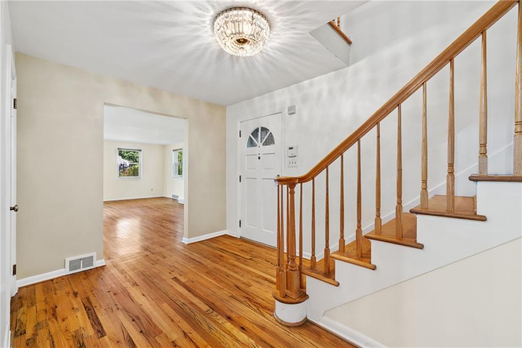 199 Farmington Road Pittsburgh, PA 15215 - Photo 3 of 46 a view of an entryway with wooden floor
