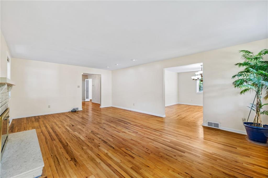 199 Farmington Road Pittsburgh, PA 15215 - Photo 5 of 46 a view of empty room with wooden floor