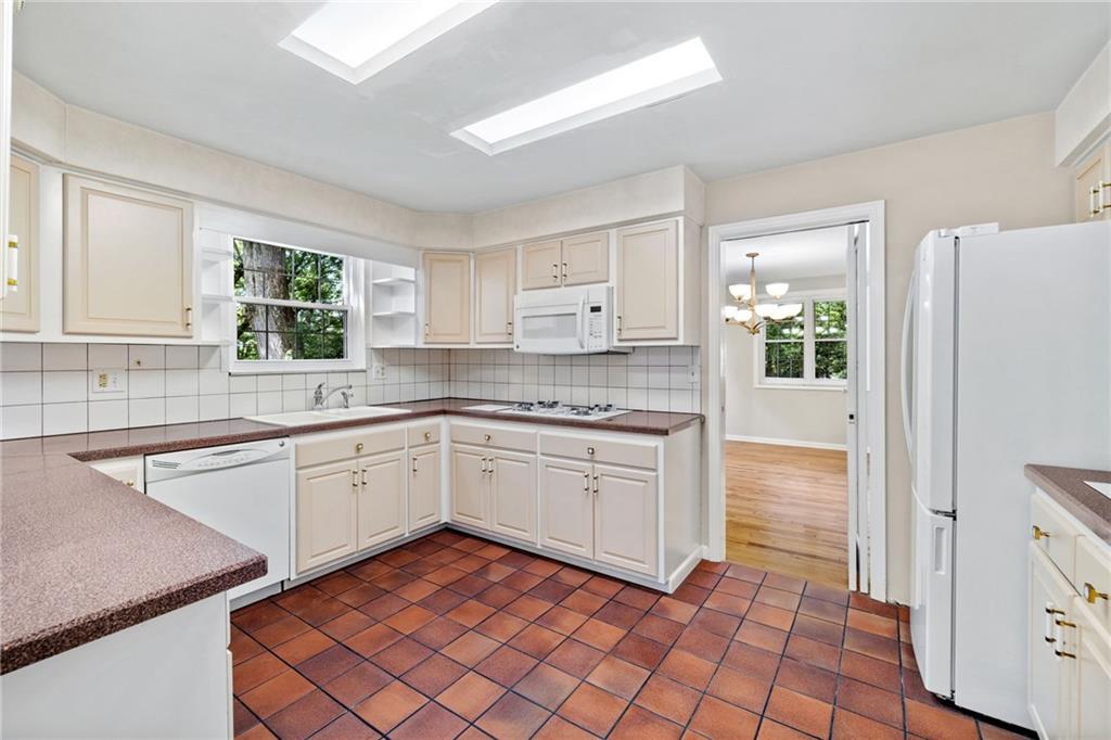 199 Farmington Road Pittsburgh, PA 15215 - Photo 10 of 46 a kitchen with a sink cabinets and window