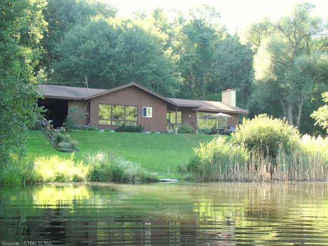312 Hanks Hill Road Mansfield, CT 06268 - Photo 1 of 1 Exterior Front. Abundant privacy and nature surround this 1,700+ sq.ft. Contemporary Ranch.
