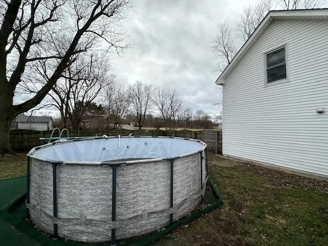a view of fountain in the backyard