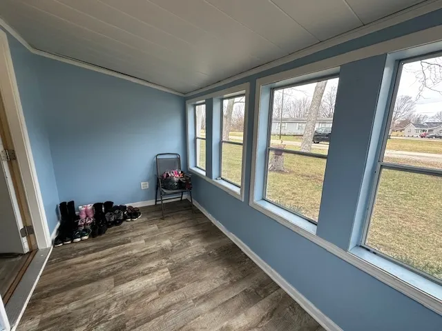 a room with furniture and a window