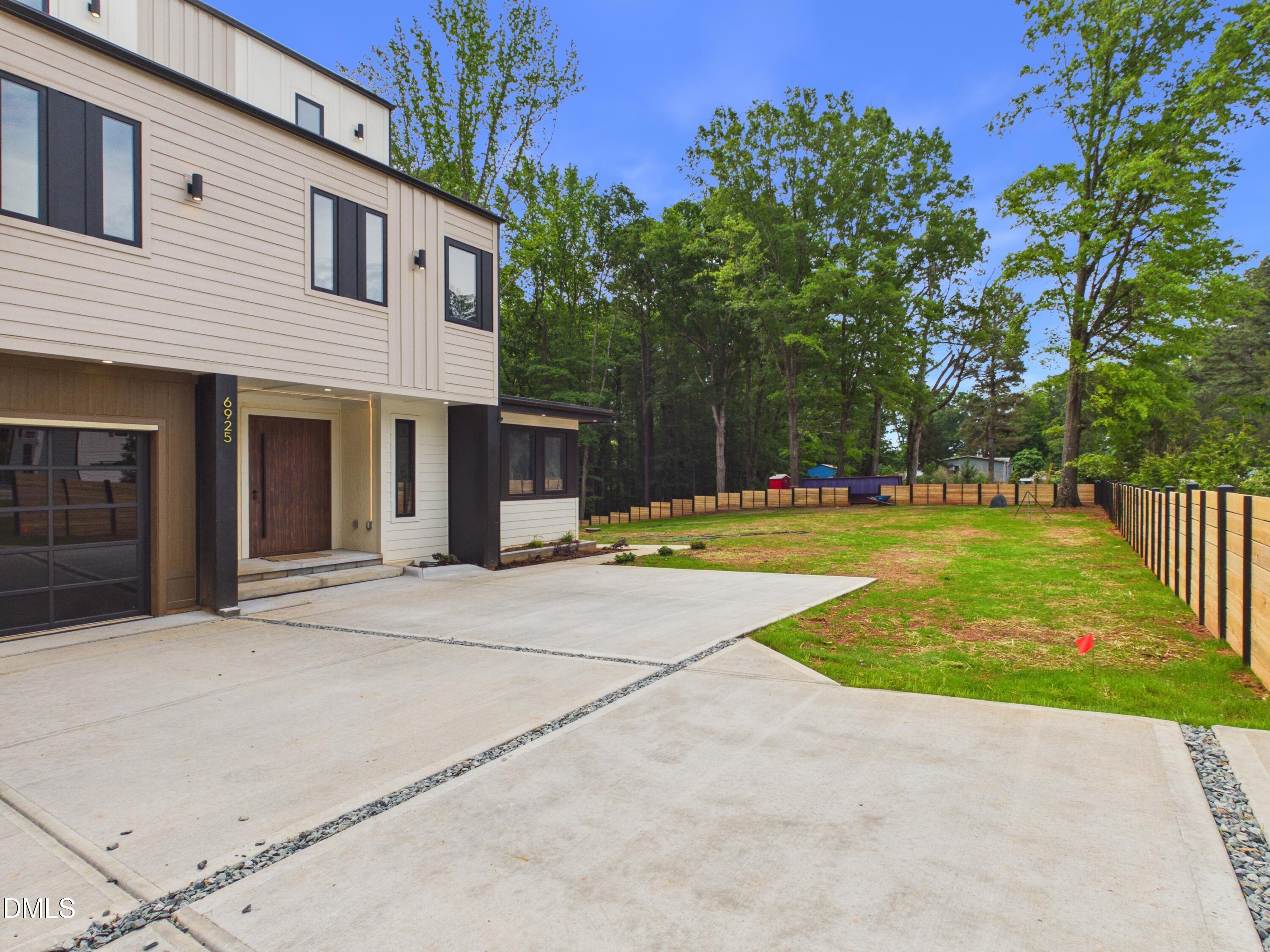 6925 Buckhorn-Duncan Road Holly Springs, NC 27540 - Photo 1 of 43 CAM06429G6-PR0022-STILL049