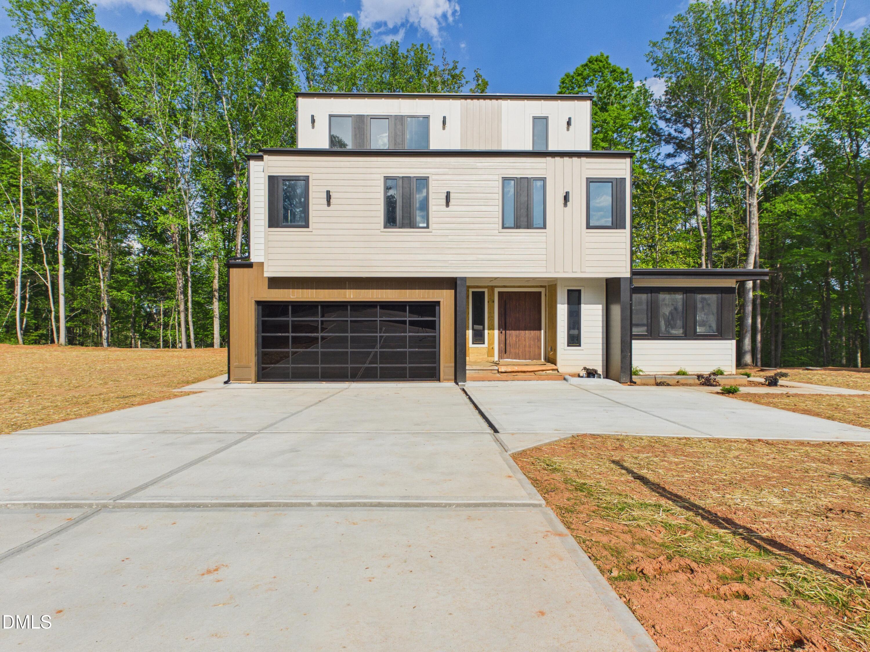6925 Buckhorn-Duncan Road Holly Springs, NC 27540 - Photo 36 of 43 front view of a house
