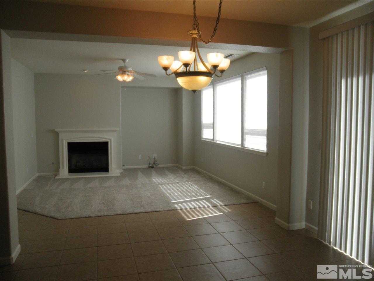 10550 Autumn Walk Court Reno, NV 89521 - Photo 5 of 15 a view of an empty room with a window
