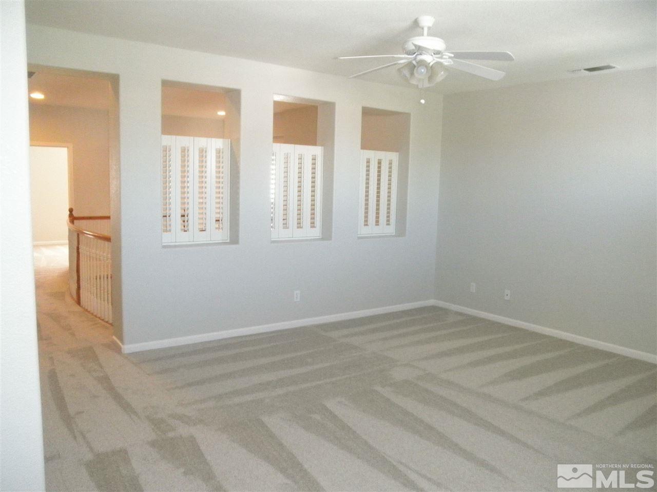 10550 Autumn Walk Court Reno, NV 89521 - Photo 10 of 15 a view of an empty room with a window