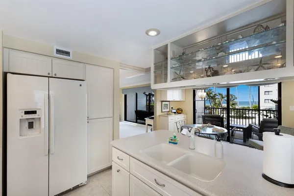 a view of a living room and chandelier