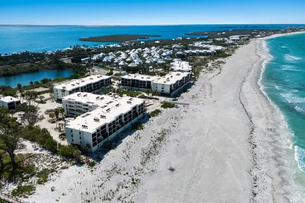 a view of a ocean with beach