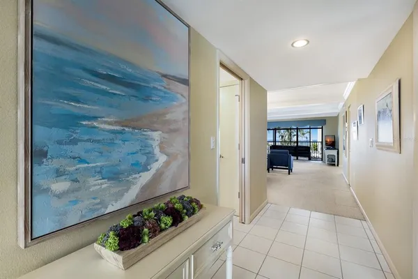 a view of livingroom with furniture and an entryway