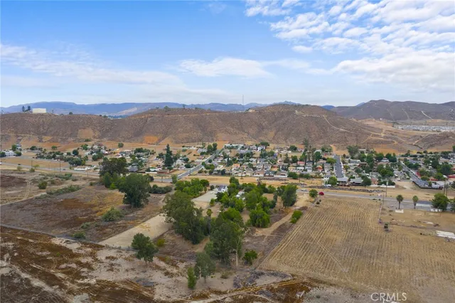 a view of a city with mountains in the background