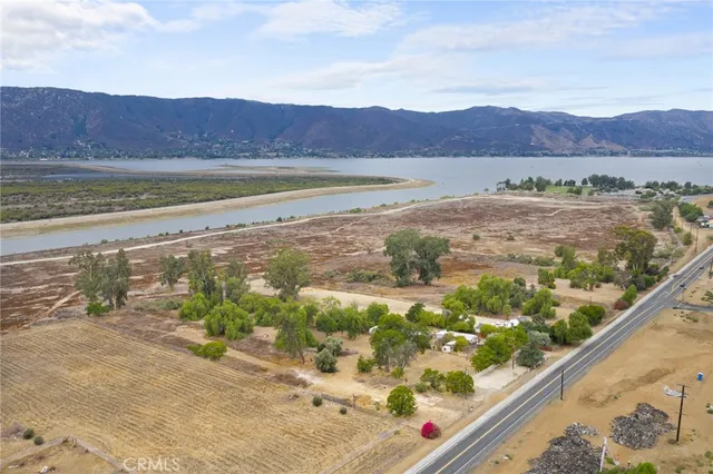 a view of an ocean and a mountain