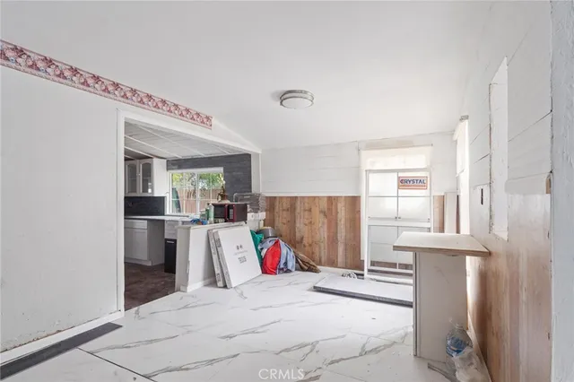 a bed room with a bed and a walk in closet