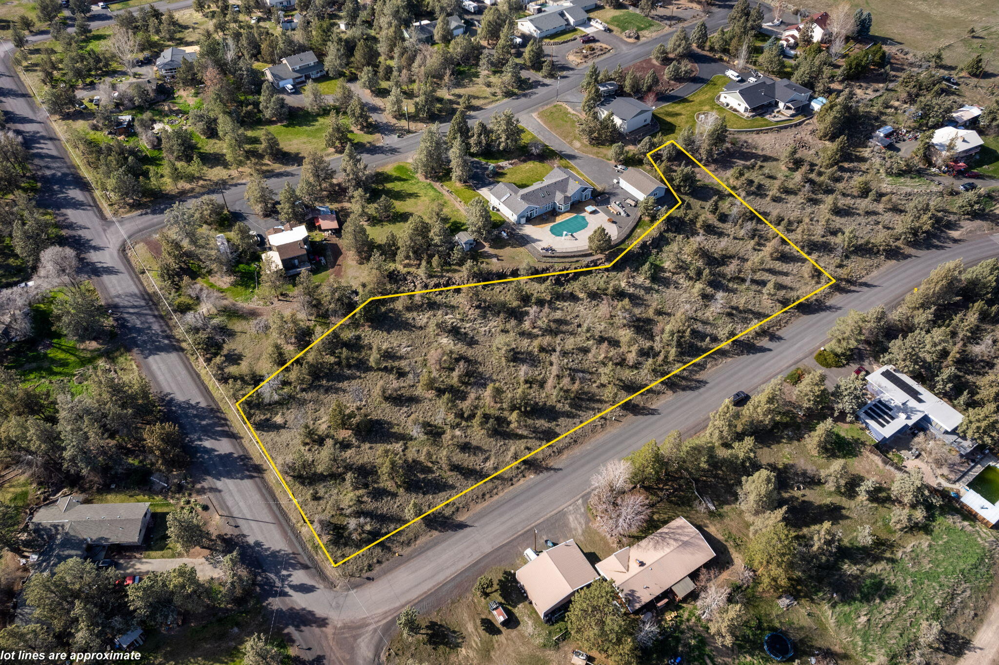 Southwest Roberta Drive Madras, OR 97741 - Photo 1 of 11 an aerial view of a residential houses with outdoor space