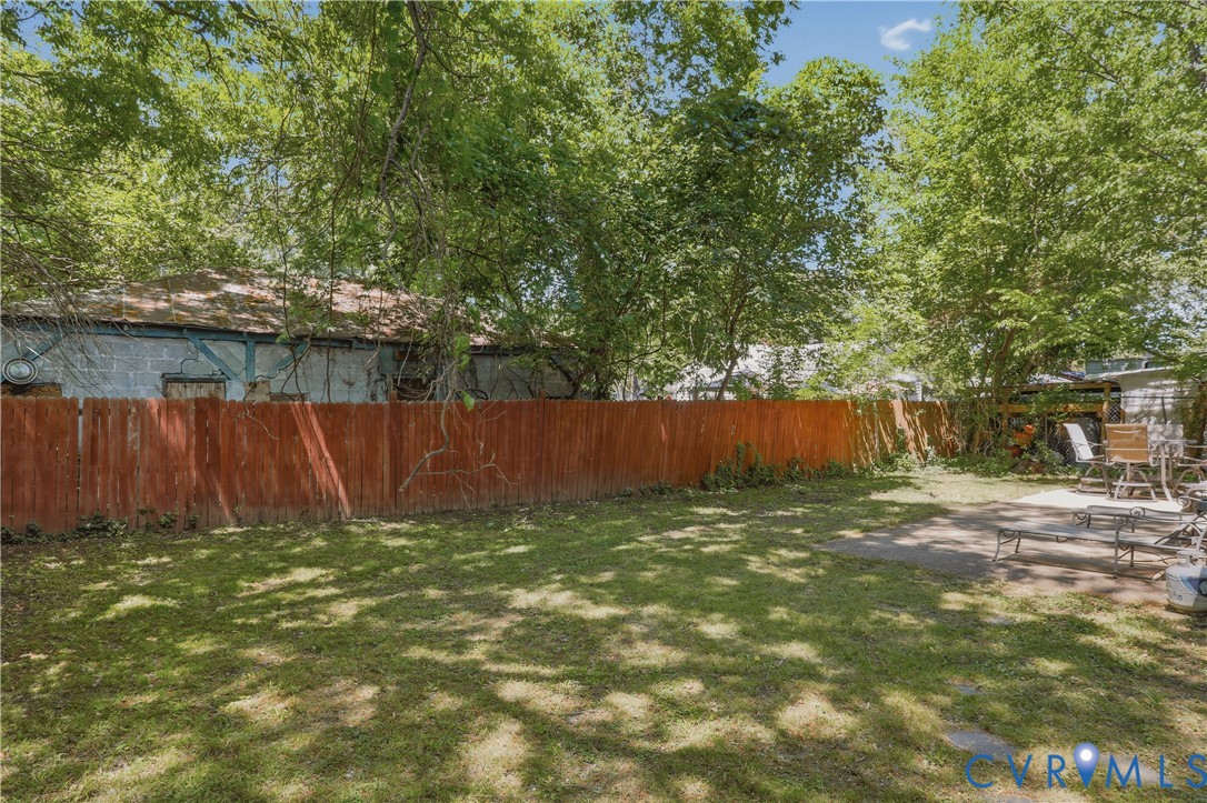 3405 East Broad Rock Road Richmond, VA 23224 - Photo 20 of 22 Large rear yard is completly fenced
