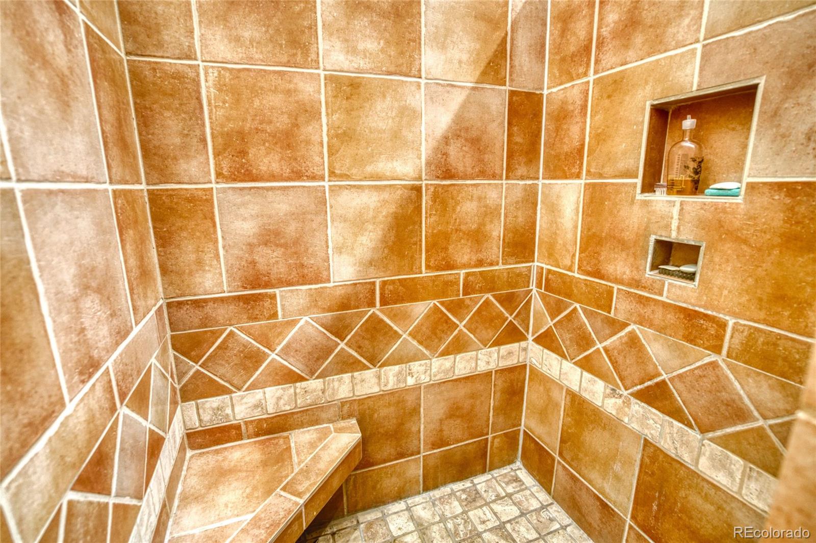 8555 Cuerna Verde Road Rye, CO 81069 - Photo 15 of 35 a bathroom with a shower and a glass door shower