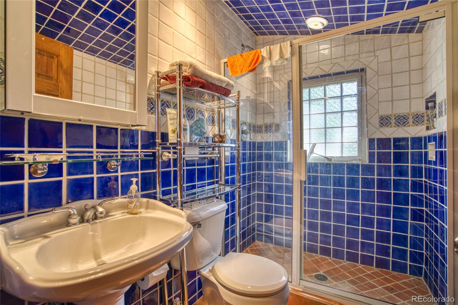 8555 Cuerna Verde Road Rye, CO 81069 - Photo 21 of 35 a bathroom with a sink a toilet and shower