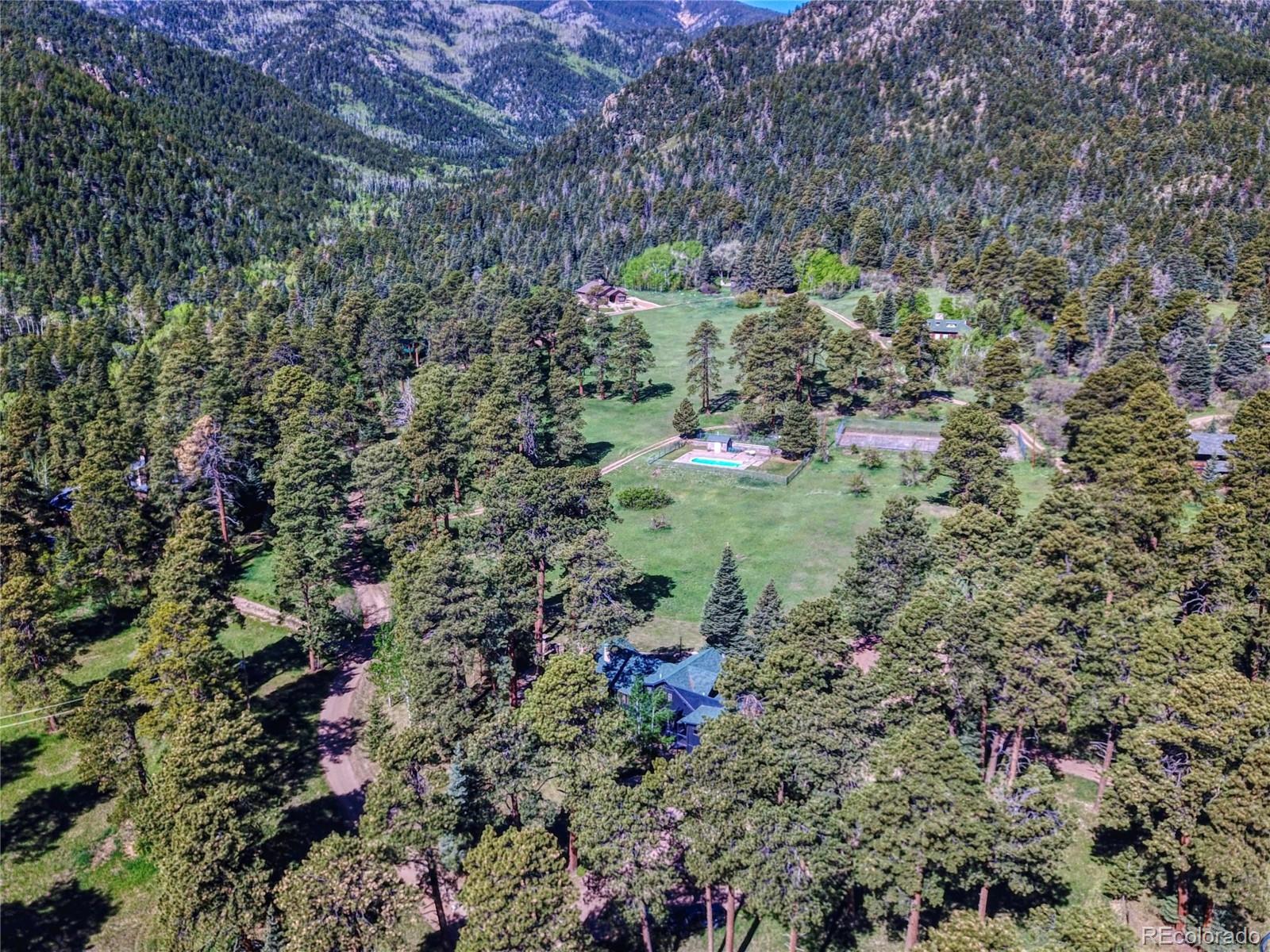 8555 Cuerna Verde Road Rye, CO 81069 - Photo 32 of 35 a view of a forest with a tree