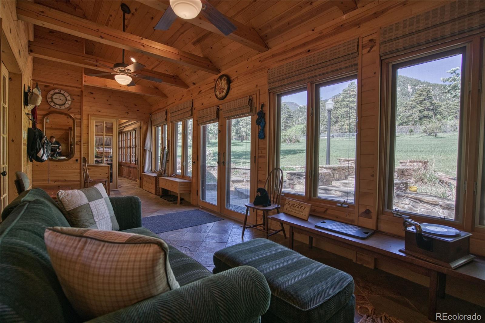 8555 Cuerna Verde Road Rye, CO 81069 - Photo 8 of 35 a living room with furniture and a large window