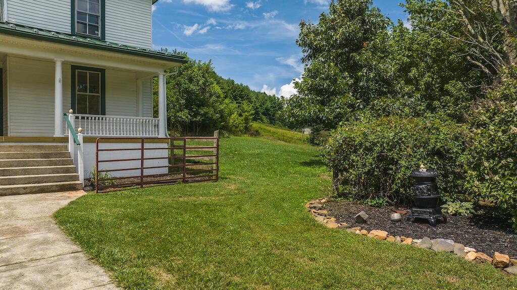 1606 Union School Road Southwest Floyd, VA 24091 - Photo 15 of 63 a view of a house with a yard