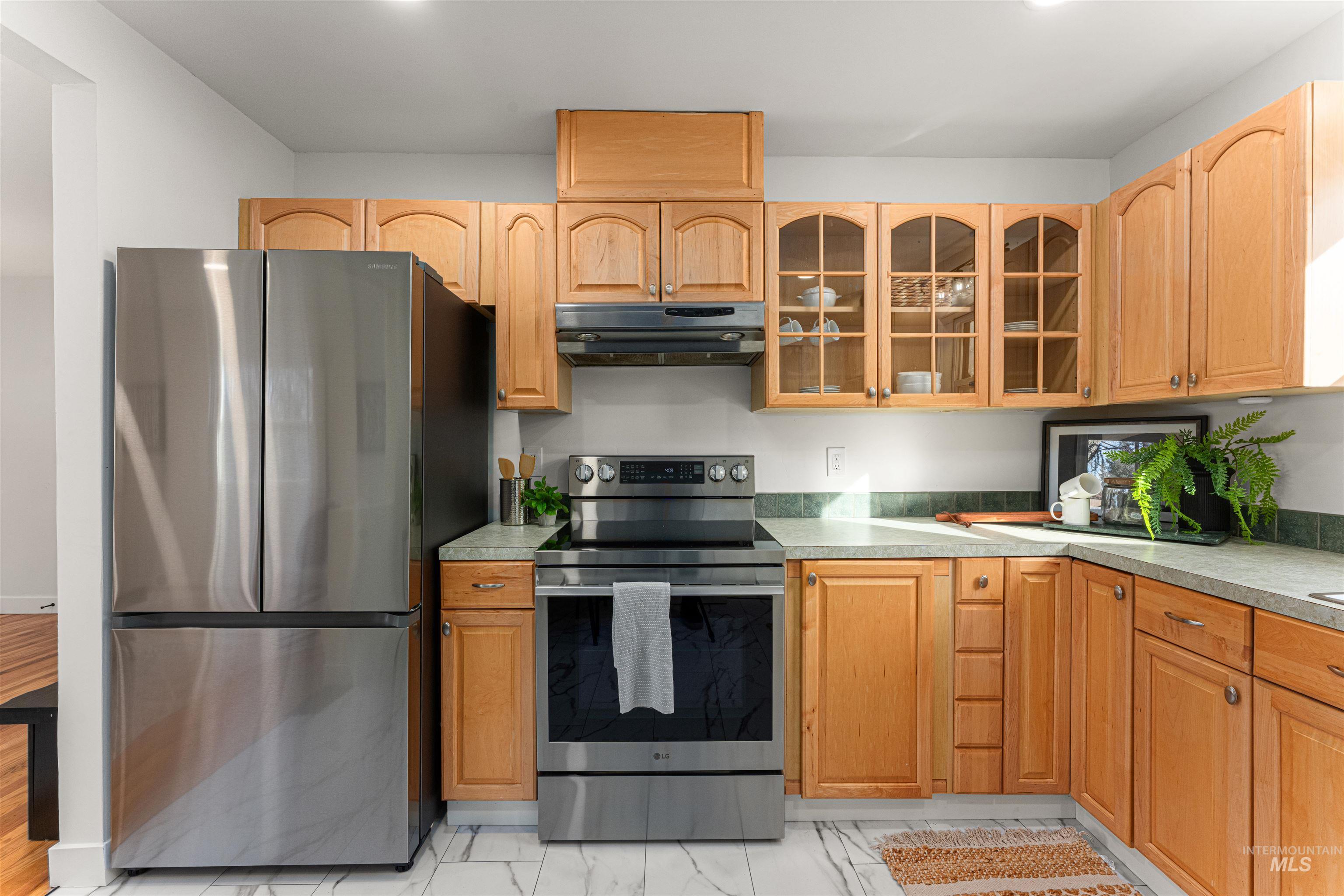 500 North Pacific Street Boise, ID 83706 - Photo 25 of 49 Bungalow-style house with a chimney, a shingled roof, and a front lawn