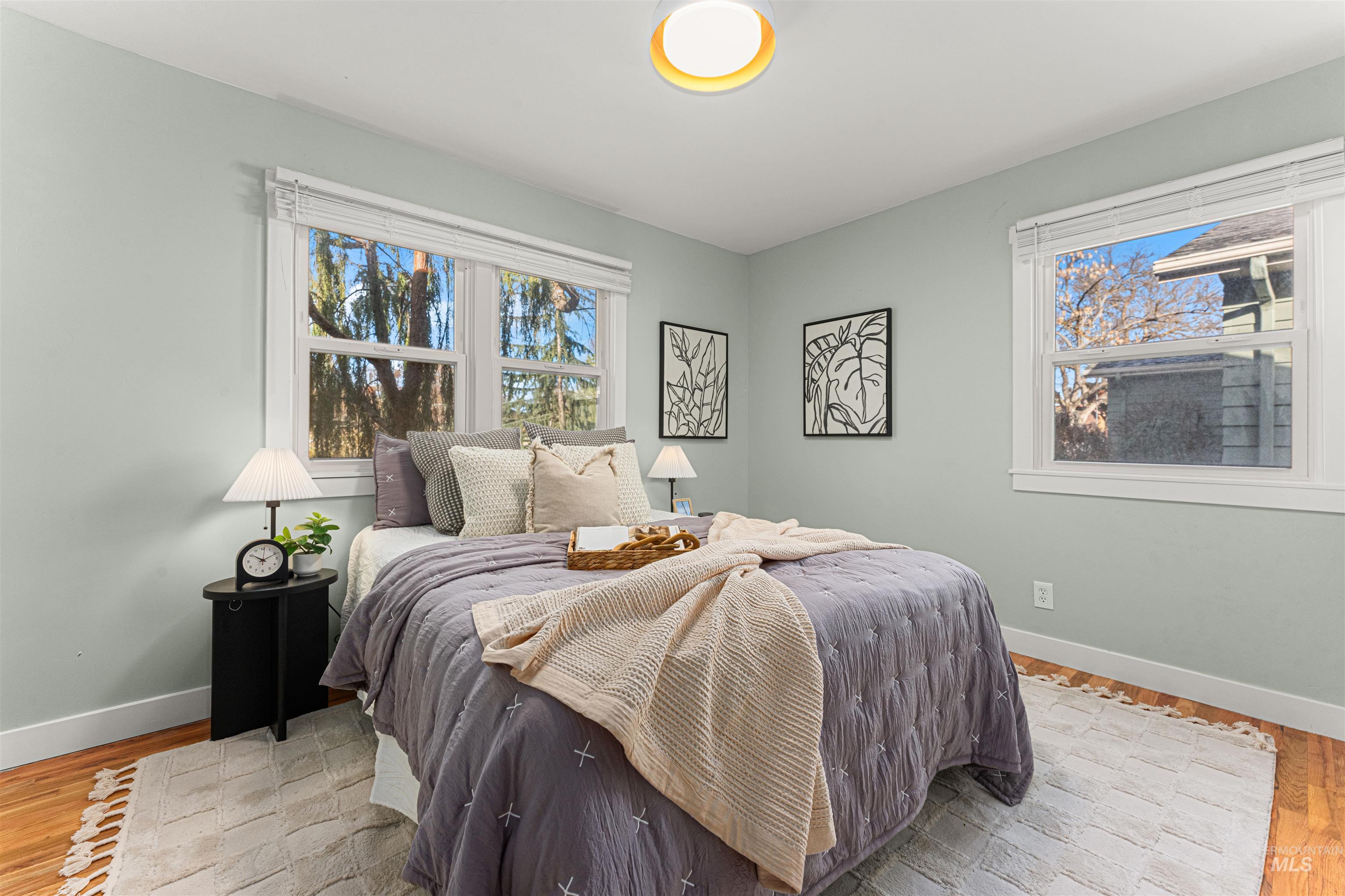 500 North Pacific Street Boise, ID 83706 - Photo 27 of 49 Bungalow-style house with a chimney, a shingled roof, and a front lawn